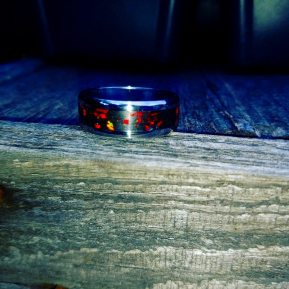 Fire opal set in crushed coal